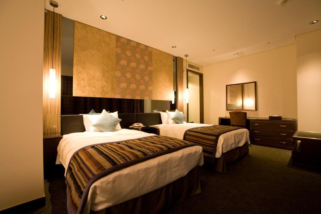 Okinawa Kariyushi Urban Resort Naha Habitación foto